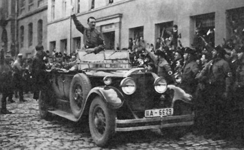 Adolf Hitler crosses Weimar after his speech in the Marktplatz in front of 1000 SA men
